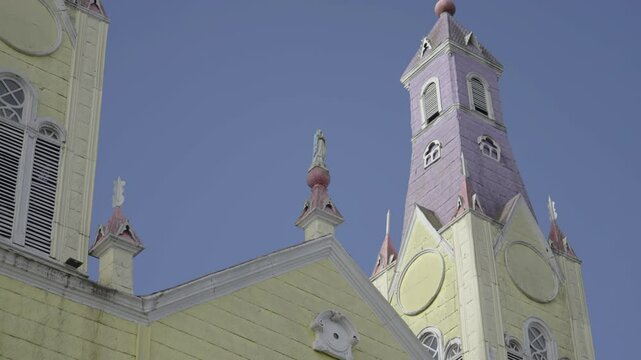 Vibrant Facade of Yellow and Purple Church San Francisco de Castro 