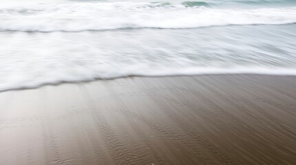 Blurred Waves Crashing on the Beach