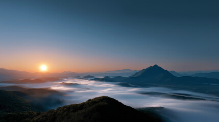 Obraz premium Sunrise Over Misty Mountains - Peaceful Dawn Landscape Nature