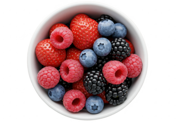 Overhead view of assorted berries in a white ceramic bowl close up