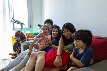 Family enjoying quality time on cozy couch