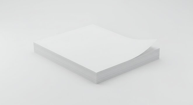 A stack of plain, flat printer paper with a small corner facing up &mdash; white background
