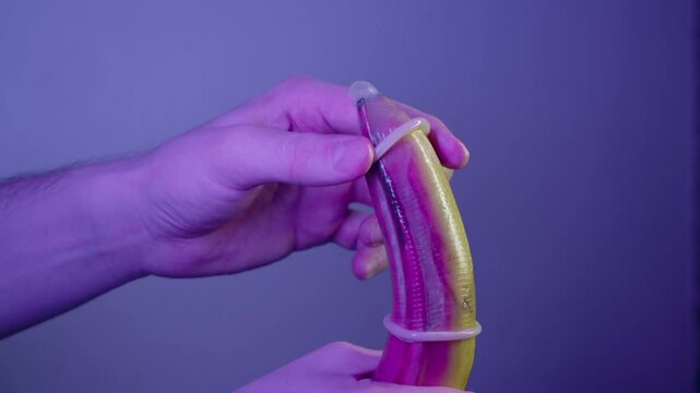 In sex education class, teacher demonstrated how to use condom properly, showing students, using banana as an example, how not to use two condoms at once.