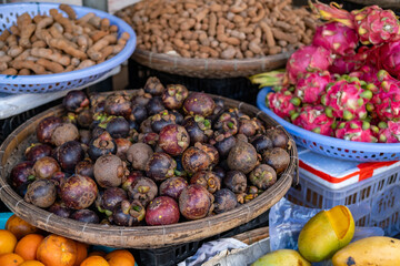 Local market with exotic fruits in Vietnam, Nha Trang resort. 
