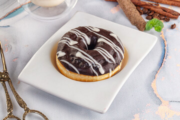 Delicous sweet donut with chocolate glaze