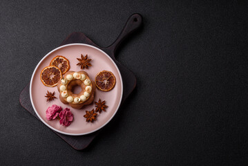 Round chocolate tart or pie with cream berry filling