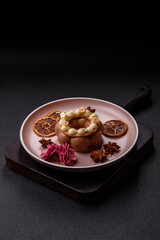Round chocolate tart or pie with cream berry filling