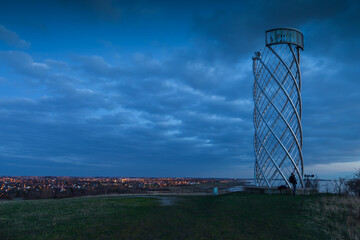 Lernacken tower at dusk overlooking city lights near Oresund Sweden.