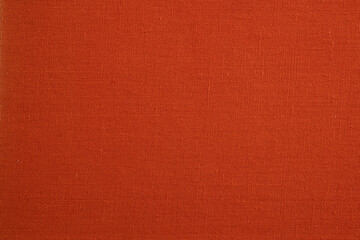 Close-up of orange fabric textile texture
