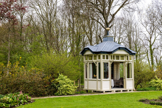 Small wooden pavilion in the park and garden of manor and estate Verhildersum in Leens The Netherlands