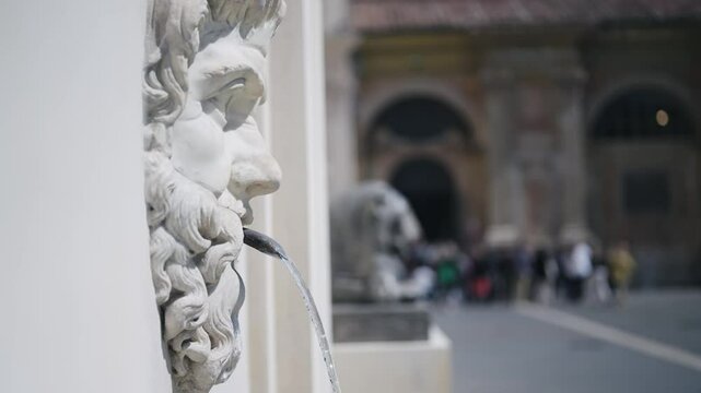 Cinematic view of Pinecone Fountain in the wall of the Pigna Courtyard, located in Vatican City, Rome, Italy