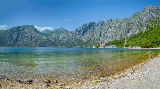 Dobrota Beach, Kotor, Montenegro: Mountains meet clear water at a rocky beach