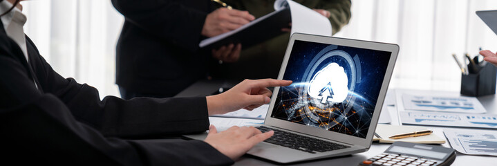 Panorama shot analyst team utilizing BI Fintech to analyze financial report with laptop....