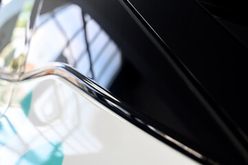 Close-up view of a car's interior, featuring a sleek black design