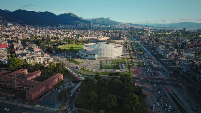 Busy Aerial View of Public Transportation, Cars, and Buildings Along Carrera 30 and TransMilenio Bus Lane - Bogot&aacute;, Colombia