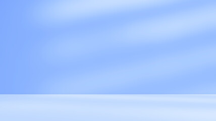 Empty blue room studio with shadow of leaves on concrete wall and floor for product presentation. Sunlight effect shadow. Minimal winter backdrop. Cosmetic, beauty and fashion showroom.