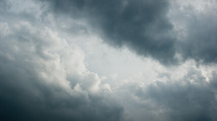 Gray contrasting fluffy storm clouds