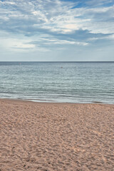 KOH SAMUI, THAILAND - JANUARY 19,2025: Beautiful beach. View of nice tropical beach with white sand ,blue sea and blue sky. Holiday and vacation concept. Tropical beach Chaweng Noi beach, Samui.
