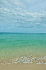 KOH SAMUI, THAILAND - JANUARY 19,2025: Beautiful beach. View of nice tropical beach with white sand ,blue sea and blue sky. Holiday and vacation concept. Tropical beach Chaweng Noi beach, Samui.
