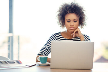 Woman, laptop and office working or serious, online project and creative workplace for website...