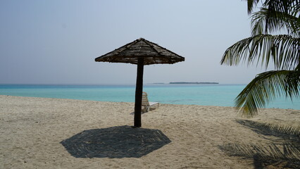beach umbrella and chairs