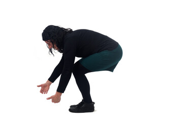 side view of a woman lifting something heavy from the ground on white background