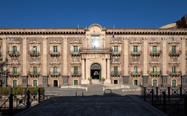 Facade of the Benedictine Monastery of St. Nicholas of Arena in Catania, Sicily, Italy in daylight