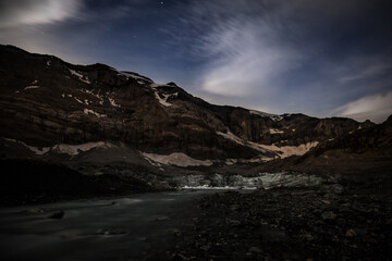 Glacial lake in the mountains in the night, Klausen Pass, Switzerland