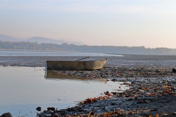 Abandoned boat on the lake.
