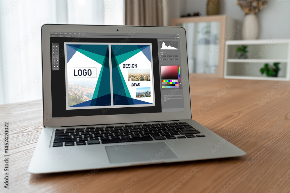 Poster graphic designer software for modern design of web page and commercial ads showing on the computer s
