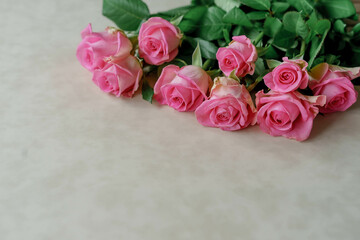 Fototapeta premium pink roses on a light background bouquet flowers love congratulations holiday mood beautiful flowers nature background