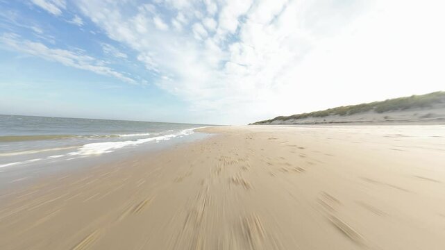 FPV drone video of the beach at Texel, The Netherlands. Sea, sand, dynamic flight.