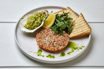 Salmon Tartare with Guacamole and Toast