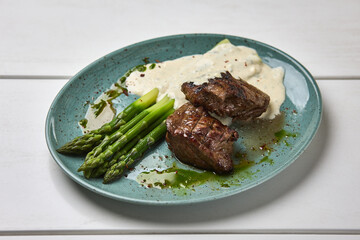Grilled Beef Tenderloin with Asparagus and Sauce