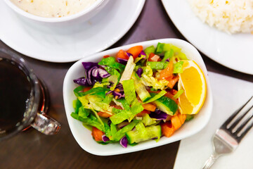 Traditional Turkish light vegetable salad Choban of cucumbers, peppers, onions, tomatoes, parsley...