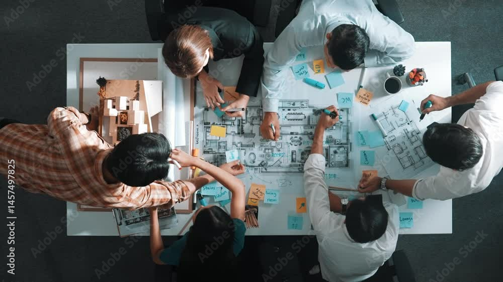 Poster top aerial view of project manager or civil engineer writing at blueprint and planning building desi