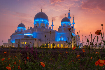 View of Sheikh Zayed Grand mosque with flowers at morning, located on Surakarta