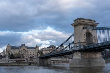 Poster Szechenyi Chain Bridge is chain bridge that spans river Danube between Buda and Pest district, western and eastern sides of Budapest, Hungary