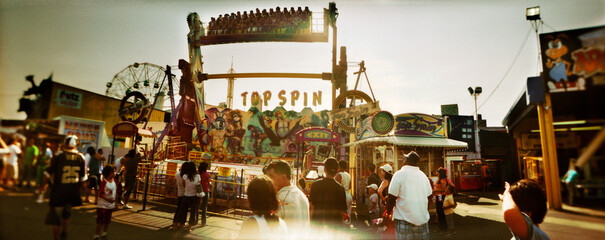 Panoramic view of tourists enjoying at an amusement park, Coney Island, Brooklyn, New York City, New York State, USA.