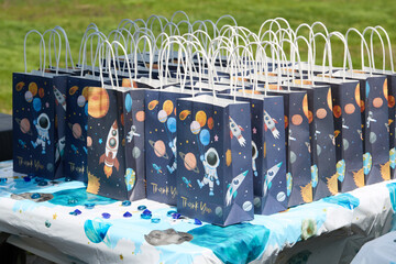 Space Theme Party Favor Bags with Rocket and Planet Design
