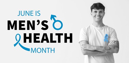 Naklejka premium Young man with blue awareness ribbon on light background. Banner for Men's Health Month