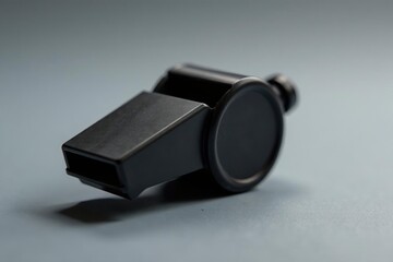 Classic black plastic whistle, simple design, clean background , isolated, signal