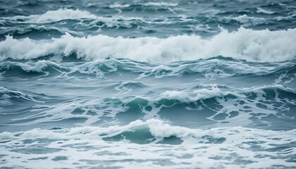 Fototapeta premium large body of water filled with lots of waves