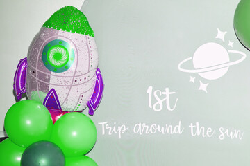 Space-Themed Birthday Backdrop with Rocket and Balloons
