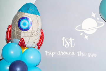 Space-Themed Birthday Backdrop with Rocket and Balloons
