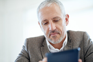 Mature, man and internet in office with tablet for corporate, online and planning for company...