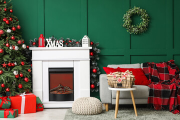 Interior of living room with fireplace, Christmas tree and Advent calendar