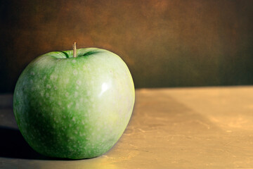 apple on a wooden table