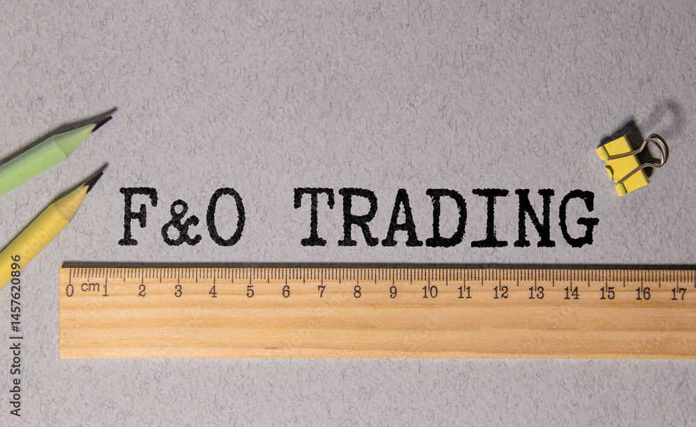 Poster f and o future and option trading inscription on notepad with calculator.