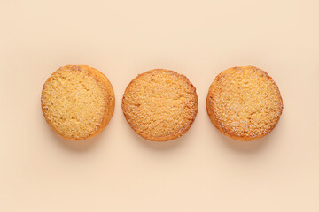 Sweet cookies on beige background
